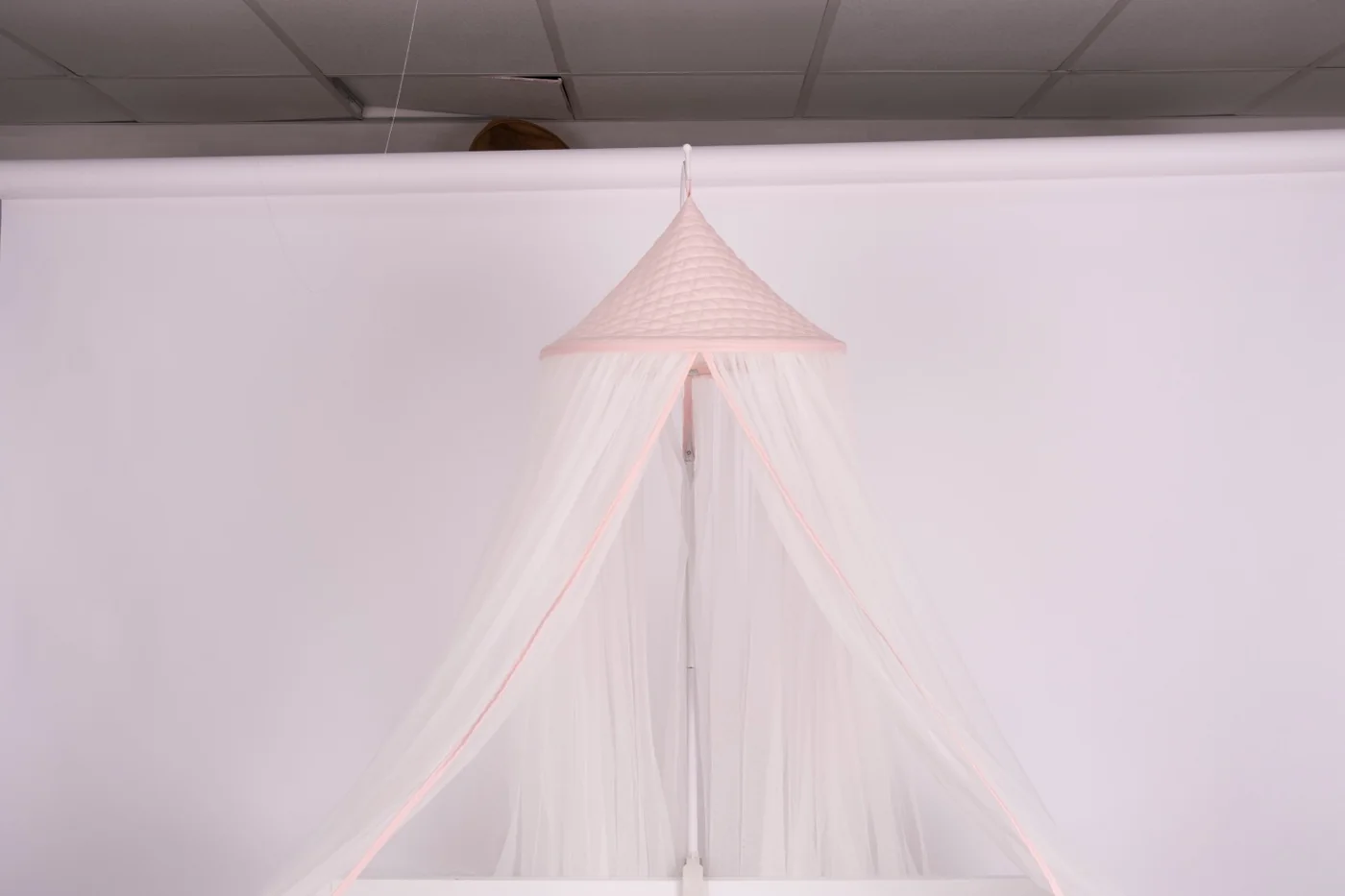 Blush quilted canopy with soft white netting